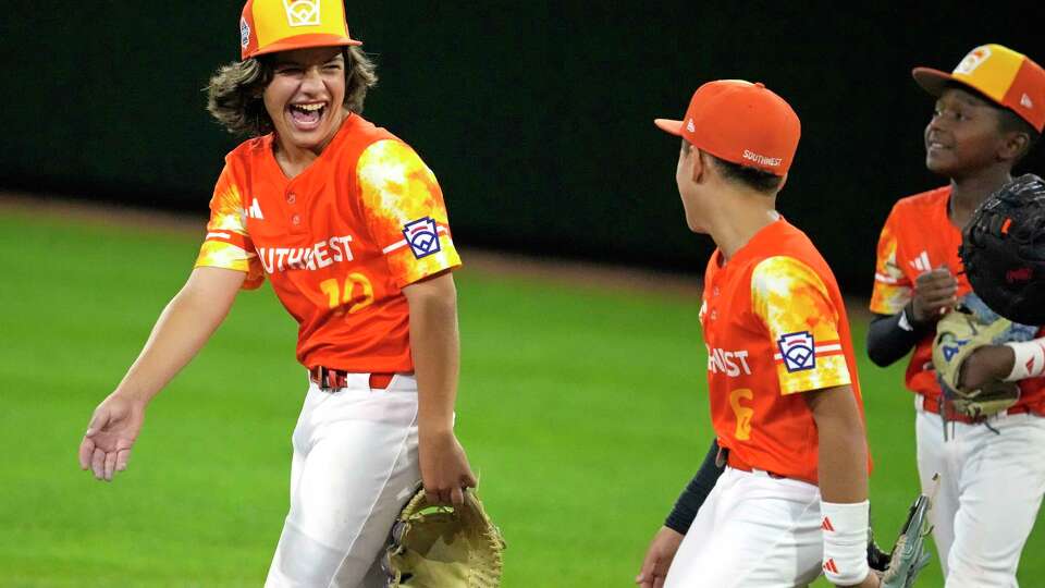 Needville, Texas' DJ Jablonski (10) celebrates with teammates after reaching his pitch limit during the sixth inning of a baseball game against Media, Pa., at the Little League World Series in South Williamsport, Pa., Wednesday, Aug. 16, 2023. (AP Photo/Gene J. Puskar)