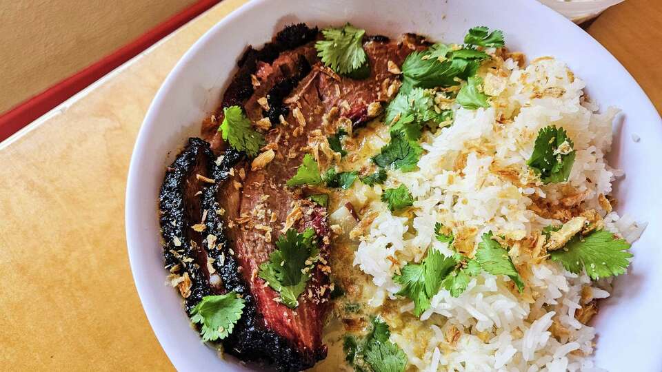 Brisket Smoke Show (oak-smoked prime brisket with green curry, jasmine rice, potatoes, carrots, cilantro and fried shallots) at Curry Boys BBQ, San Antonio