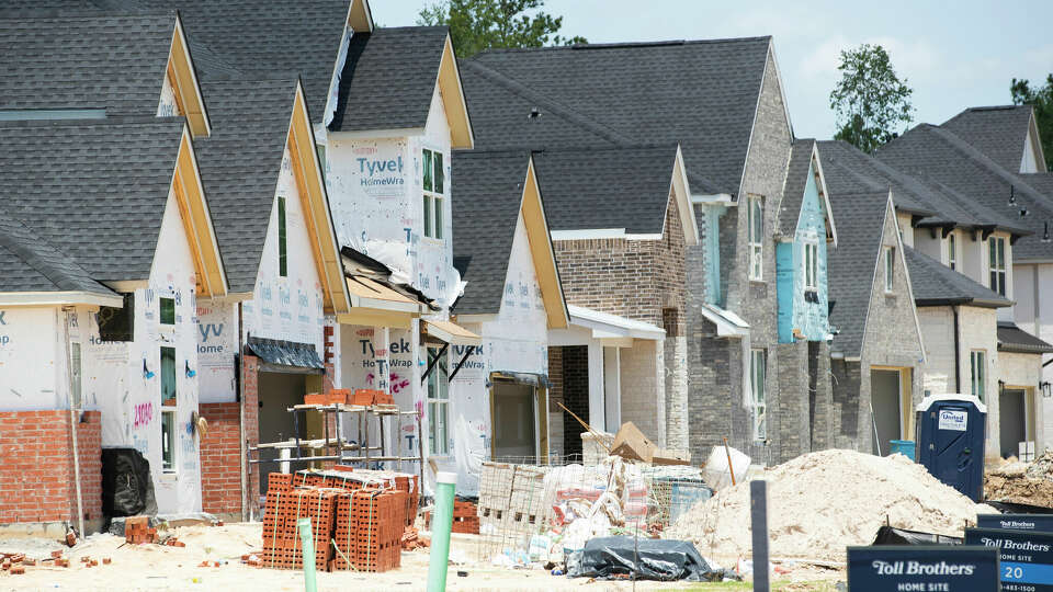 Home construction continues near Conroe ISD's Christopher J. Hines Elementary, Wednesday, June 28, 2023, in Spring.