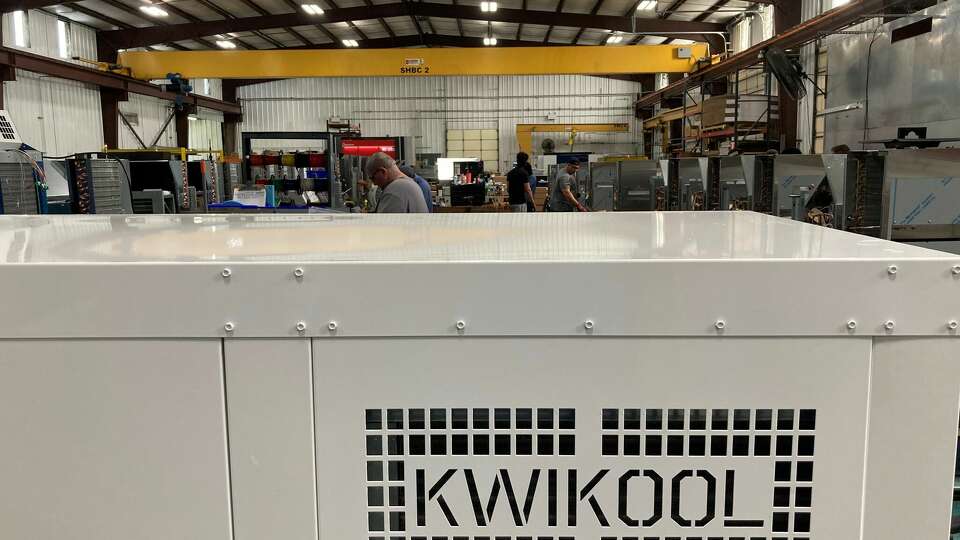 KwiKool Portable Cooling Systems makes portable air conditioners on wheels at its Stafford headquarters.