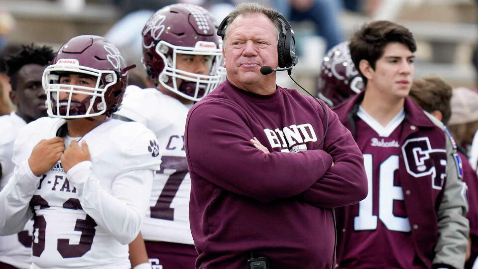 Cy-Fair head coach Jeff Miller watches from the sideline during the first half of a high school football game against Cy-Ridge, Saturday, Oct. 29, 2022, in Houston.