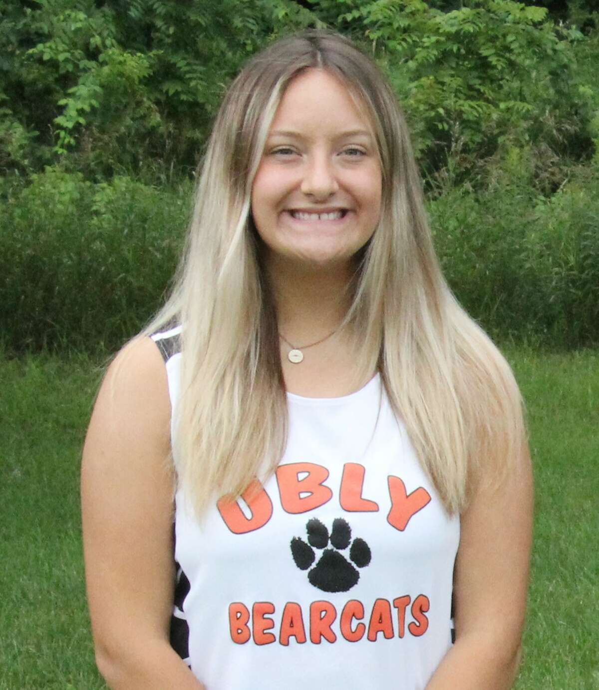 Ubly cross country runner Emily Greyerbiehl is interviewed