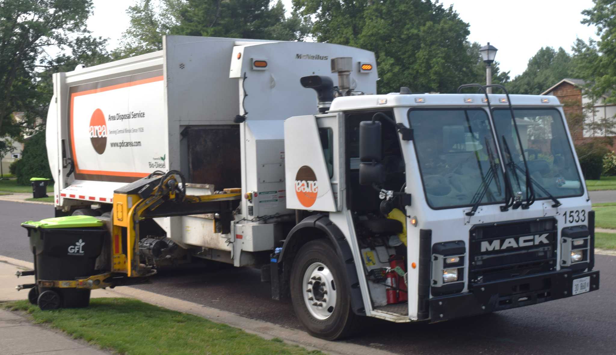 Illplaced garbage totes in Jacksonville causing traffic hazards