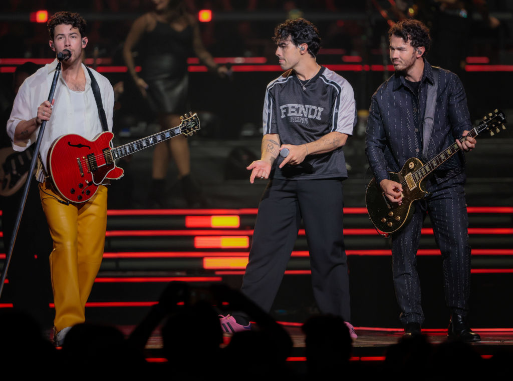 The Jonas Brothers, from left, Nick, Joe and Kevin perform during