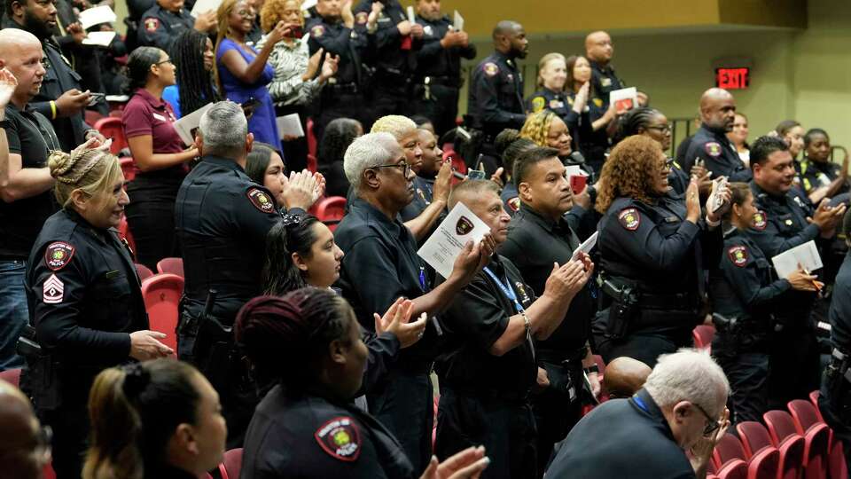 Houston ISD's new police chief Shamara Garner receives a standing ovation after being sworn in as the first woman chief in the district's history during a ceremony at Jack Yates High School, Friday, Aug. 18, 2023, in Houston.