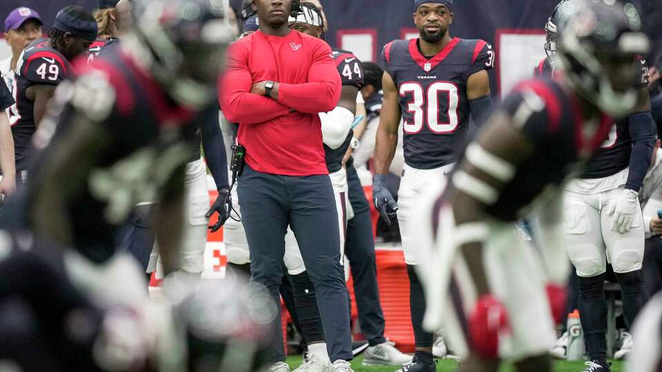 Houston Texans head coach DeMeco Ryans watches his team from the bench during the first half an NFL preseason football game Saturday, Aug. 19, 2023, in Houston.