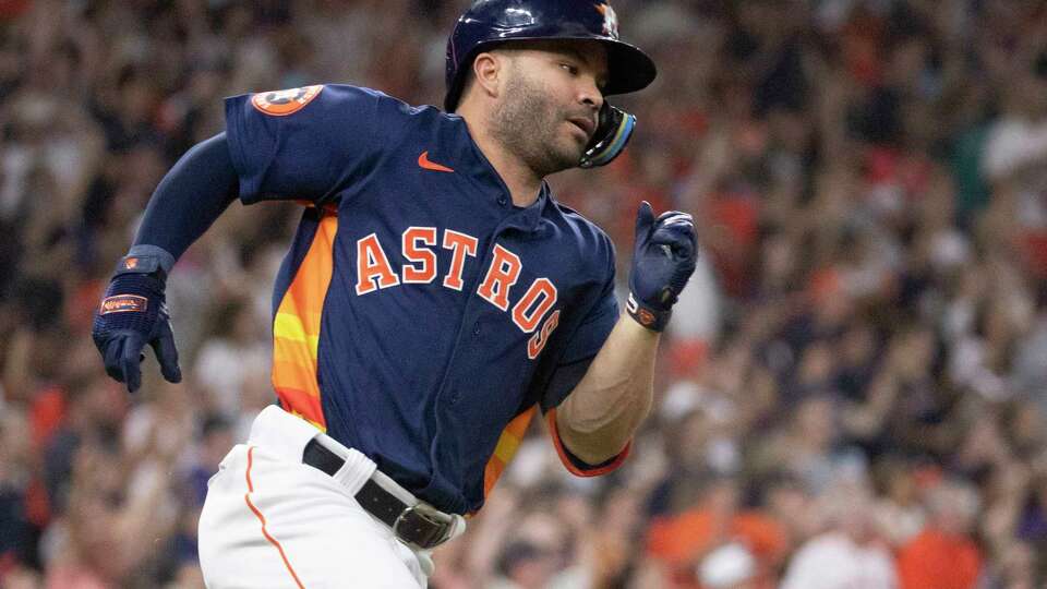 Houston Astros' Jose Altuve hits a single for his 2,000th career hit during the fifth inning of a Major League Baseball game at Minute Maid Park, Saturday, Aug. 19, 2023, in Houston.