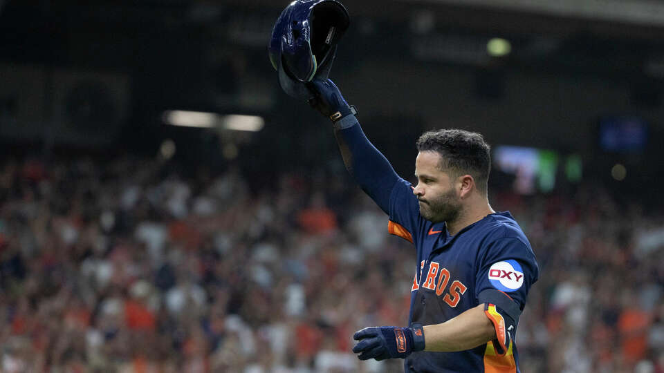 Houston Astros' Jose Altuve reacts after hitting a single for his 2,000th career hit during the third inning of a Major League Baseball game at Minute Maid Park, Saturday, Aug. 19, 2023, in Houston.