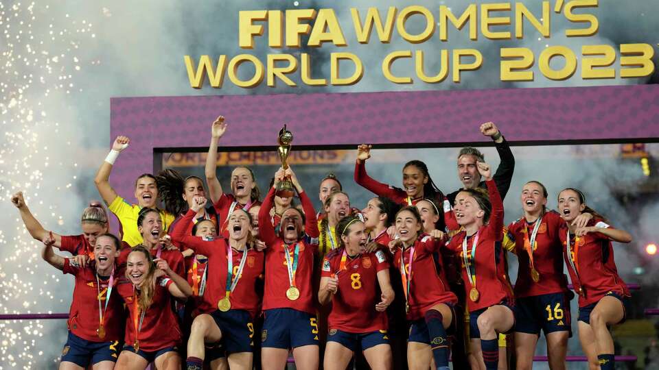 Team Spain celebrates after winning the Women's World Cup soccer final against England at Stadium Australia in Sydney, Australia, Sunday, Aug. 20, 2023.