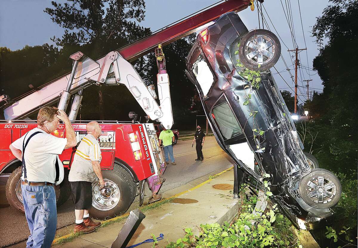 Tuesday crash in Alton drops SUV 20 feet to Rock Spring Creek