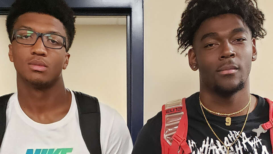 Dawson defensive ends Charles Anderson (left) and Eddy Smith are an intimidating presence on the football field for the Eagles. Both players have committed to play football at Texas Tech.