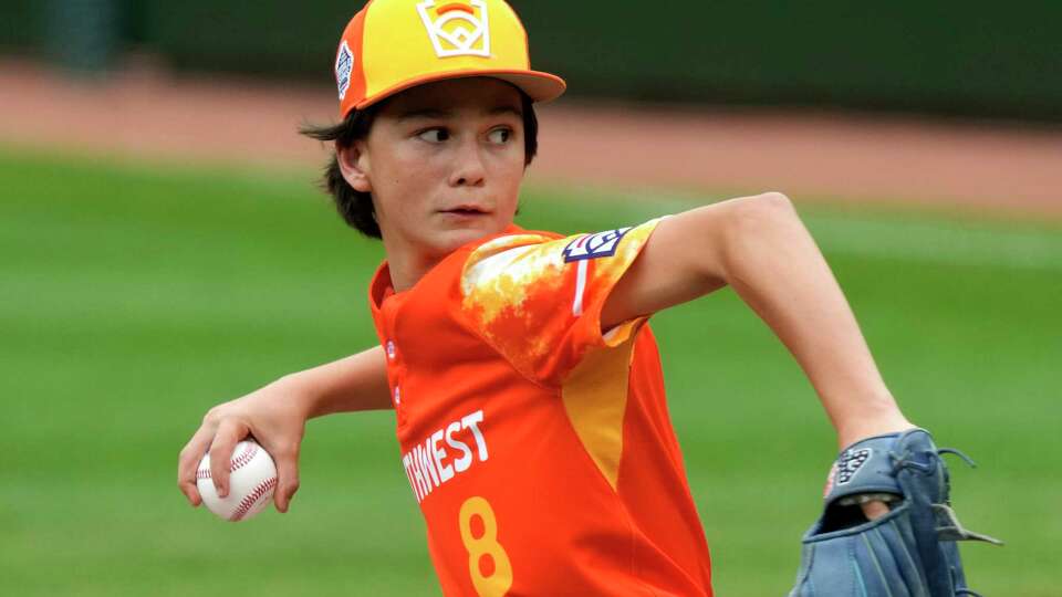 Needville, Texas' Easton Benge delivers during the first inning of a baseball game against Seattle, Washington at the Little League World Series in South Williamsport, Pa., Wednesday, Aug. 23, 2023. (AP Photo/Gene J. Puskar)