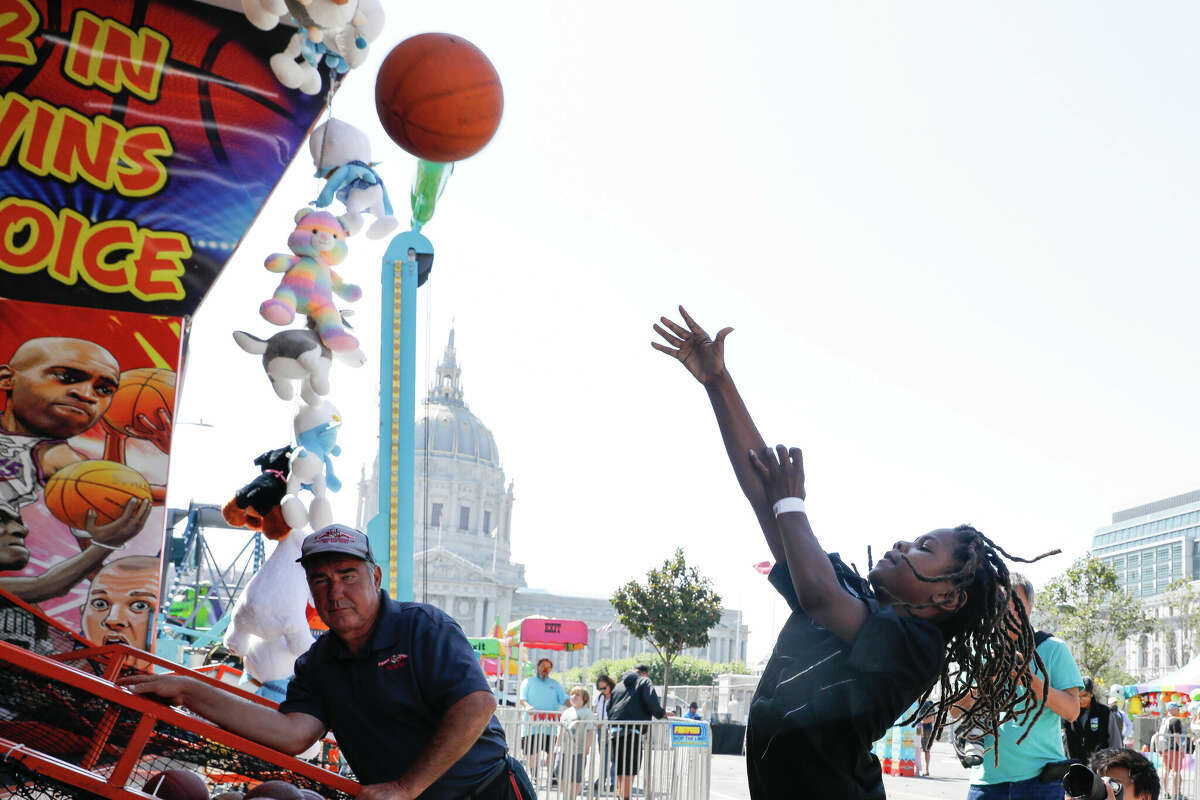 Carnival replaces drug squalor in S.F.’s Civic Center with amusement