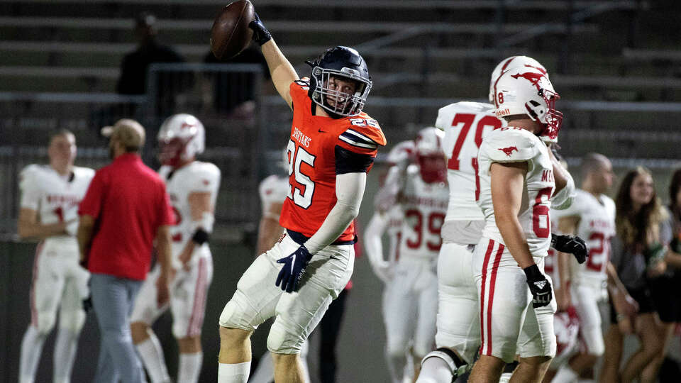 Katy Seven Lakes linebacker Austin Easterling (25) reacts after recovering a Houston Memorial fumble during the first half of a non-district high school football game at Legacy Stadium, Thursday, Aug. 24, 2023, in Katy.