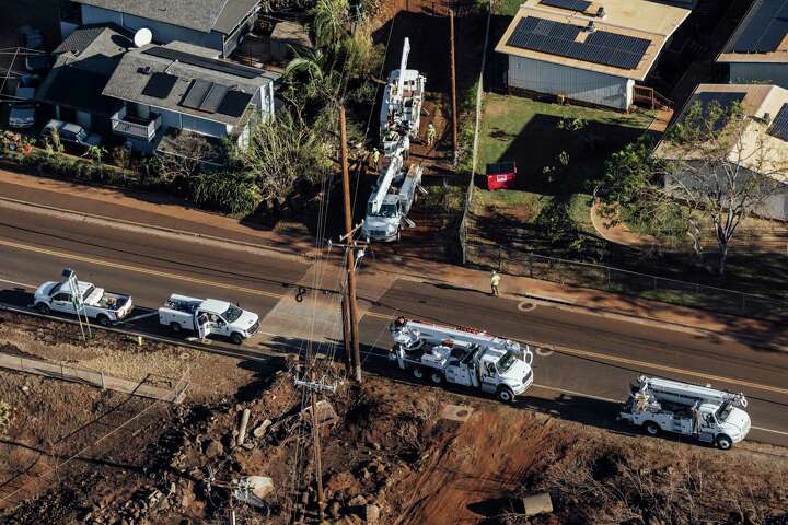 Lahaina Fire Photo Shows Utility Removing Electrical Equipment