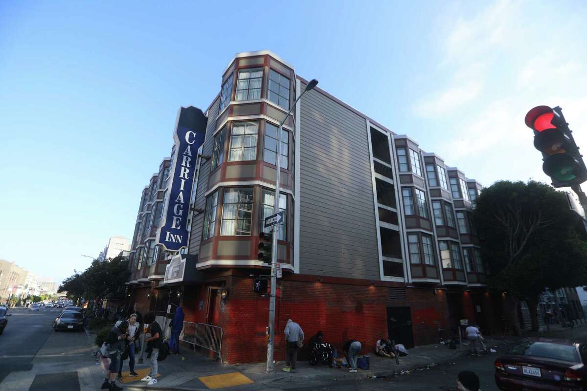 The sidewalks outside the former Carriage Inn Best Western at 140 Seventh St. in San Francisco, which is being rebranded as Hotel Fiona, are known for attracting drug users.