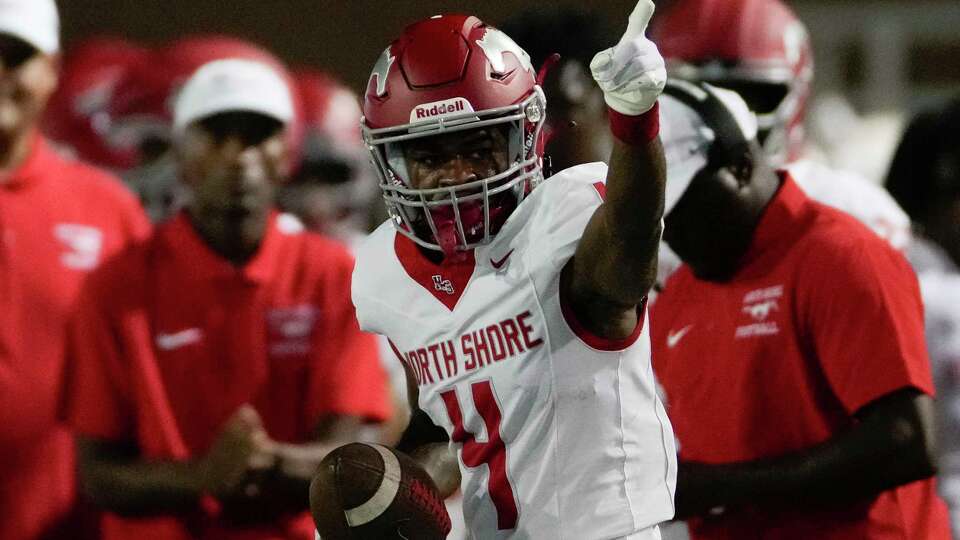 North Shore wide receiver Terrence Guillory (4) motions after picking up a first down during the second quarter of a non-district high school football game at Woodforest Bank Stadium, Friday, Aug. 25, 2023, in Shenandoah.