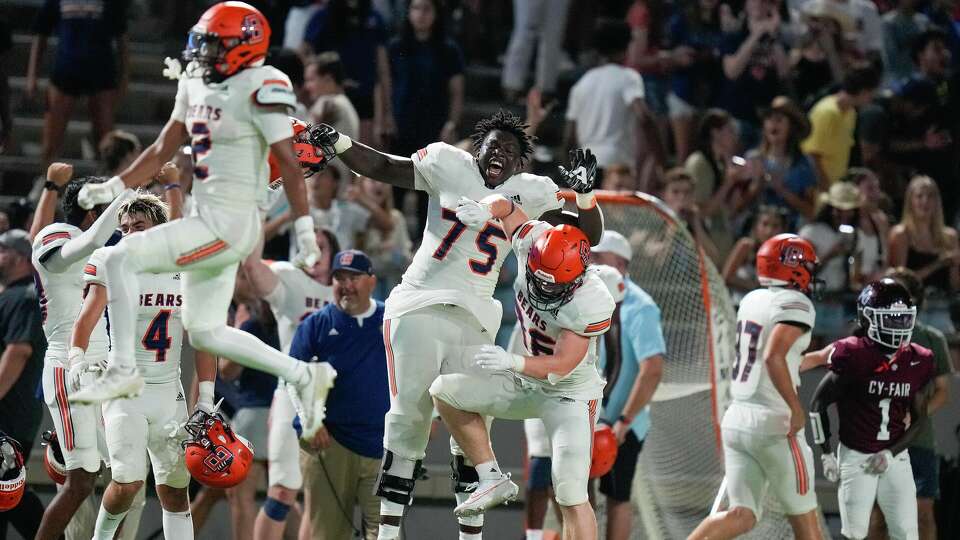 Bridgeland's Jonte Newman (75) and teammates celebrate near the end of the team's victory over Cy-Fair during the second half of a high school football game, Friday, Aug. 25, 2022, in Houston.