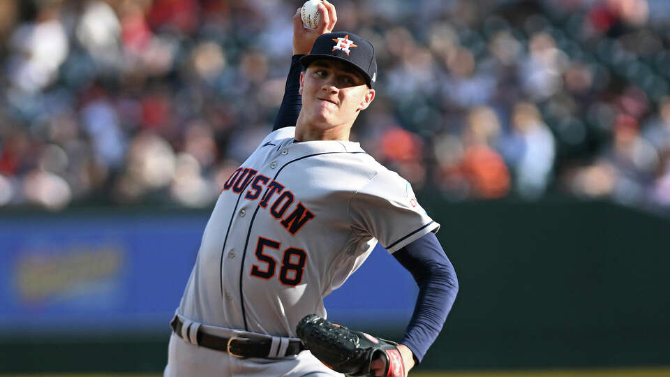 Houston Astros starting pitcher Hunter Brown (58) throws a pitch against the Detroit Tigers in the first inning of a baseball game, Saturday, Aug. 26, 2023 in Detroit. (AP Photo/Lon Horwedel)