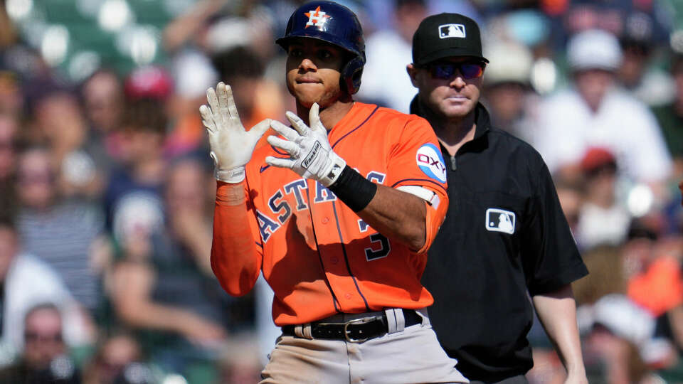 Houston Astros' Jeremy Pena (3) celebrates his two-run triple against the Detroit Tigers in the eighth inning of a baseball game, Sunday, Aug. 27, 2023, in Detroit. (AP Photo/Paul Sancya)