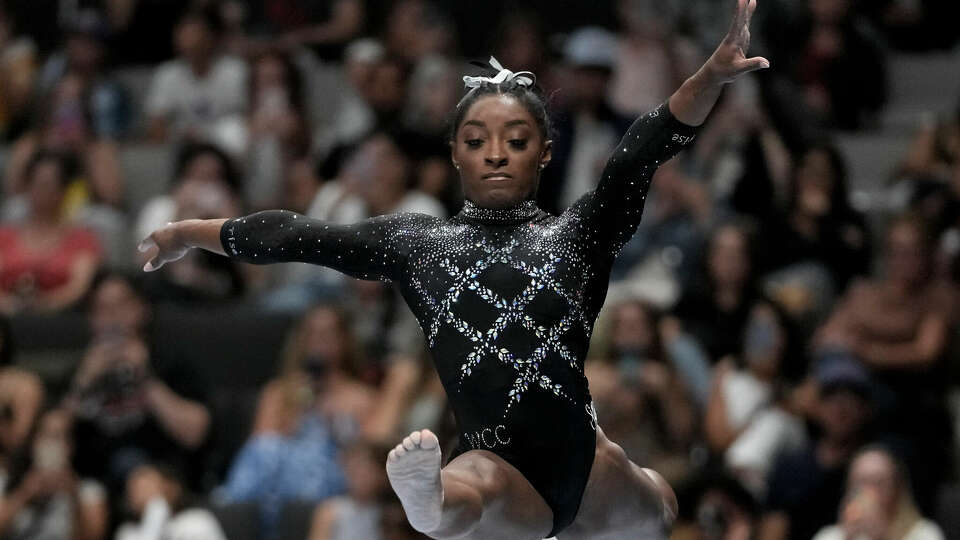 Simone Biles competes on the beam during the U.S. Gymnastics Championships, Sunday, Aug. 27, 2023, in San Jose, Calif. (AP Photo/Godofredo A. V·squez)