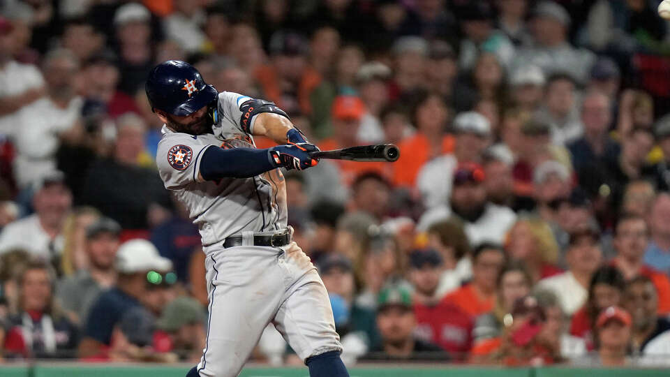 Houston Astros' Jose Altuve hits a two-run triple in the sixth inning of a baseball game against the Boston Red Sox, Monday, Aug. 28, 2023, in Boston. (AP Photo/Steven Senne)