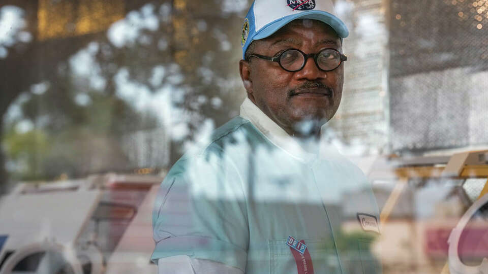 Artist and Chief Curator at Houston Museum of African American Culture Christopher Blay showcases a new installation in the ION Building on Tuesday, Aug. 22, 2023, in Houston.