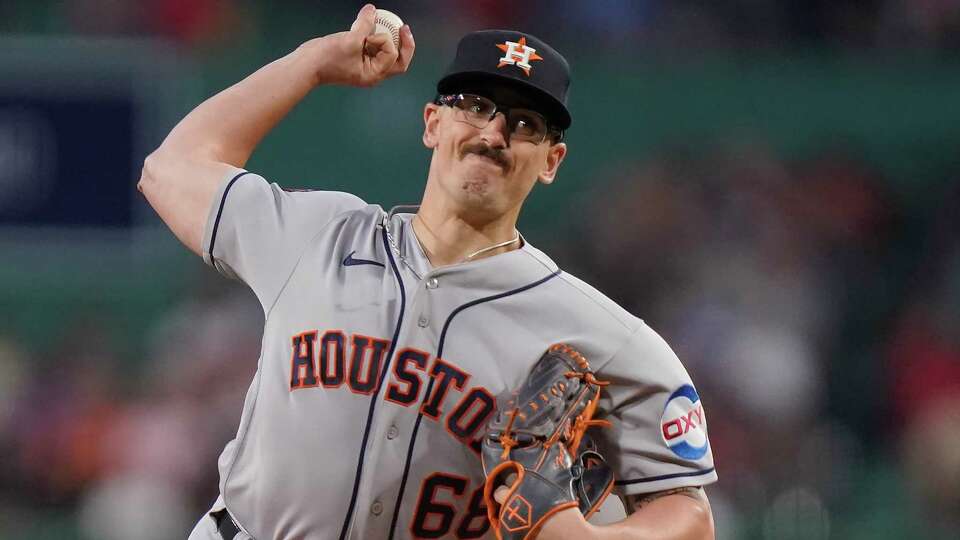 Houston Astros starting pitcher J.P. France throws to a Boston Red Sox batter during the first inning of a baseball game Tuesday, Aug. 29, 2023, in Boston. (AP Photo/Steven Senne)