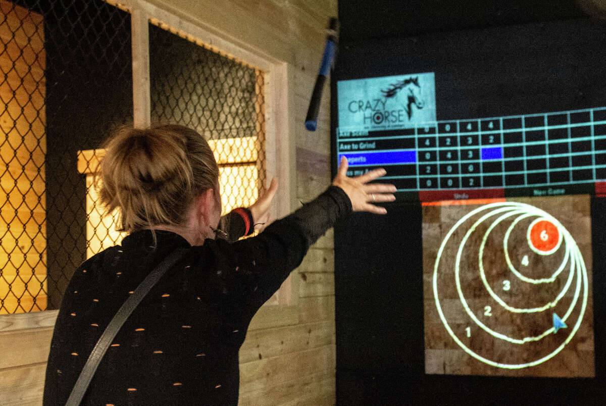 Retired Bridgeport cop opens new axe throwing place in Milford