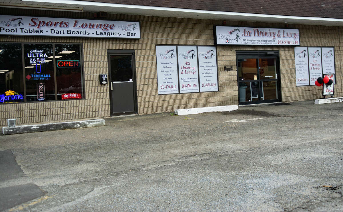 Retired Bridgeport cop opens new axe throwing place in Milford