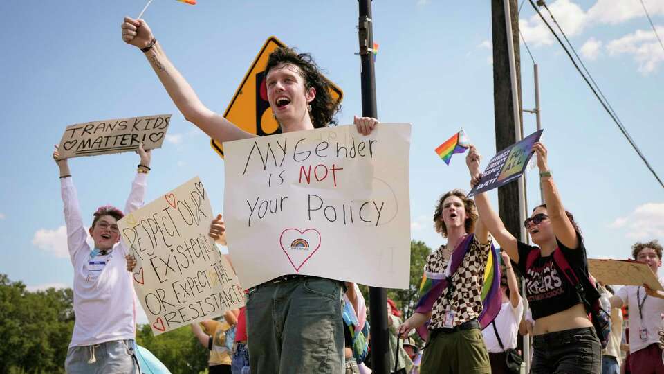 Saturn Ferguson joins students protesting against Katy ISD's new transgender policy outside the school districts educational support complex on Wednesday, Aug. 30, 2023 in Katy. The students are protesting a new policy by the district where parents of students in the Katy ISD school system must be notified if their child asks to be identified as transgender under a new policy that took effect Tuesday.