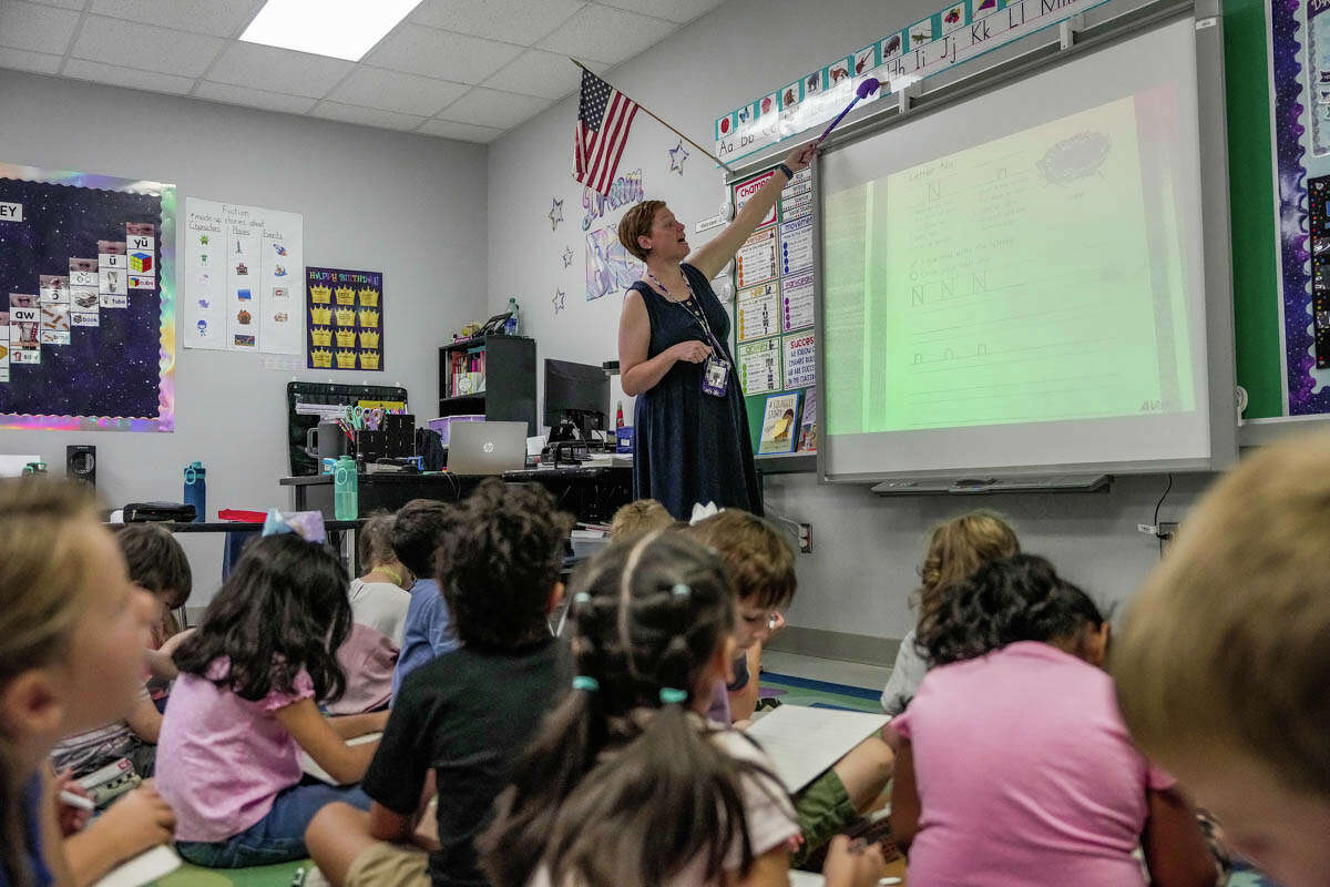Kindergarten teacher Abby Smith in her classroom on Thursday, Aug. 31, 2023, at Cedric C. Smith Elementary School in Magnolia. After undergoing weight loss surgery November of last year due to health concerns, Abby has lost 86 pounds and says she no longer gets tired so quickly and is able to better engage with her students.