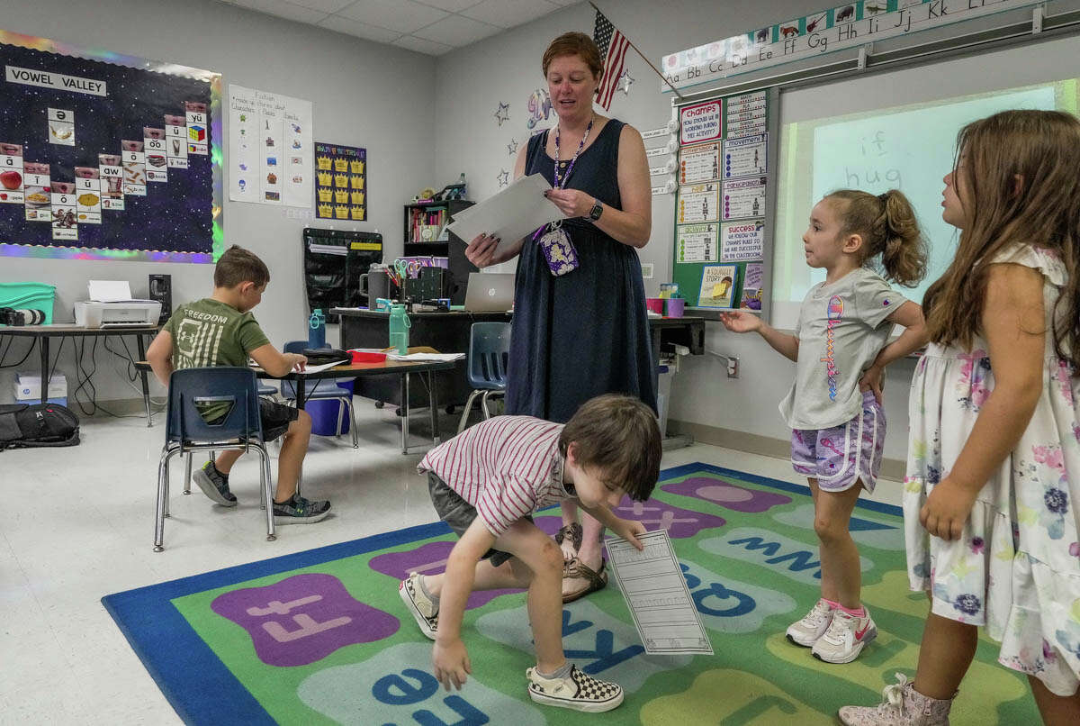 Kindergarten teacher Abby Smith in her classroom on Thursday, Aug. 31, 2023, at Cedric C. Smith Elementary School in Magnolia. After undergoing weight loss surgery November of last year due to health concerns, Abby has lost 86 pounds and says she no longer gets tired so quickly and is able to better engage with her students.