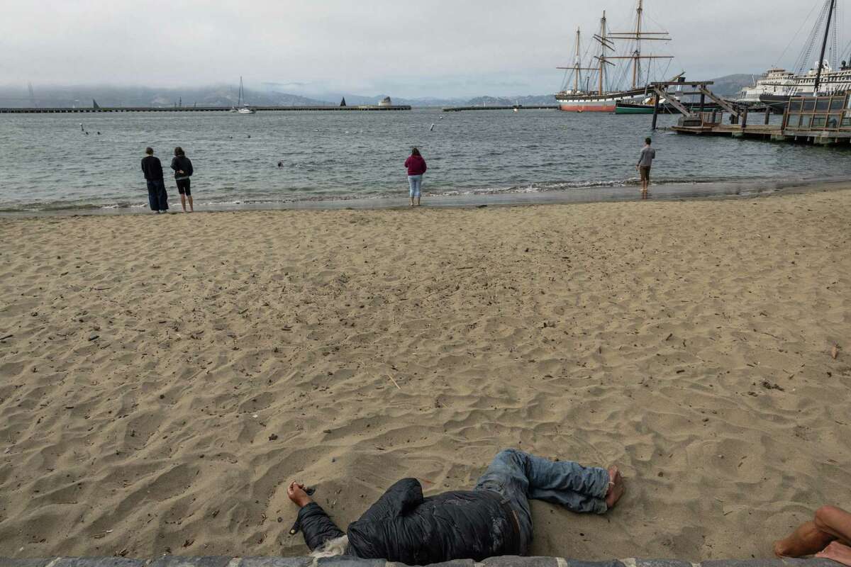 How do Fisherman's Wharf tourists and merchants feel after Pier 39