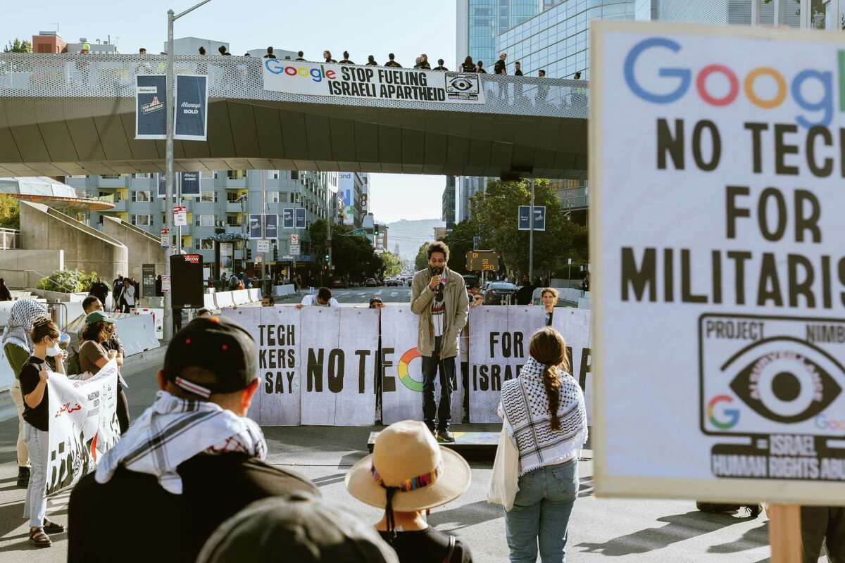 Tongo Eisen-Martin, San Francisco’s poet laureate, shares a poem during the Google Cloud Next conference at Moscone Center as activists protest the company’s AI contracts with the Israeli government and military.