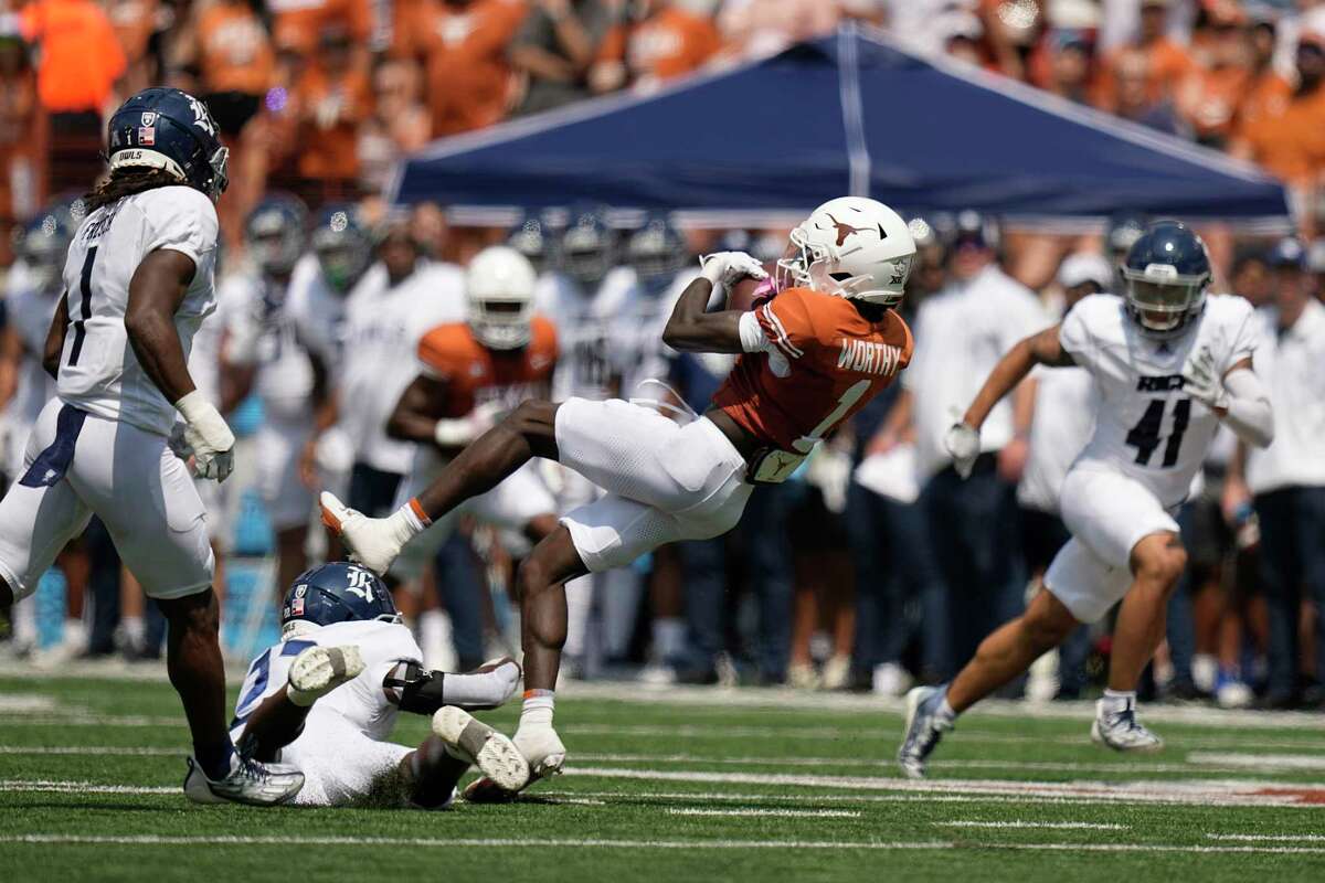 No. 11 Texas slow start to beat Rice in season opener