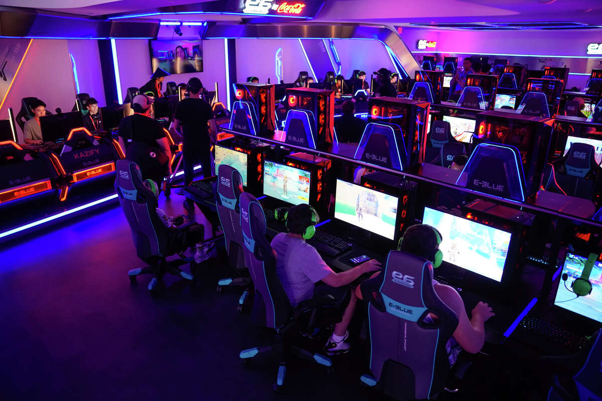 Players from all over the country man their screens during Saturday's E6 gaming tournament in a new e-gaming facility recently completed at Six Flags Fiesta Texas. There was over $30,000 in prize money for the event.
