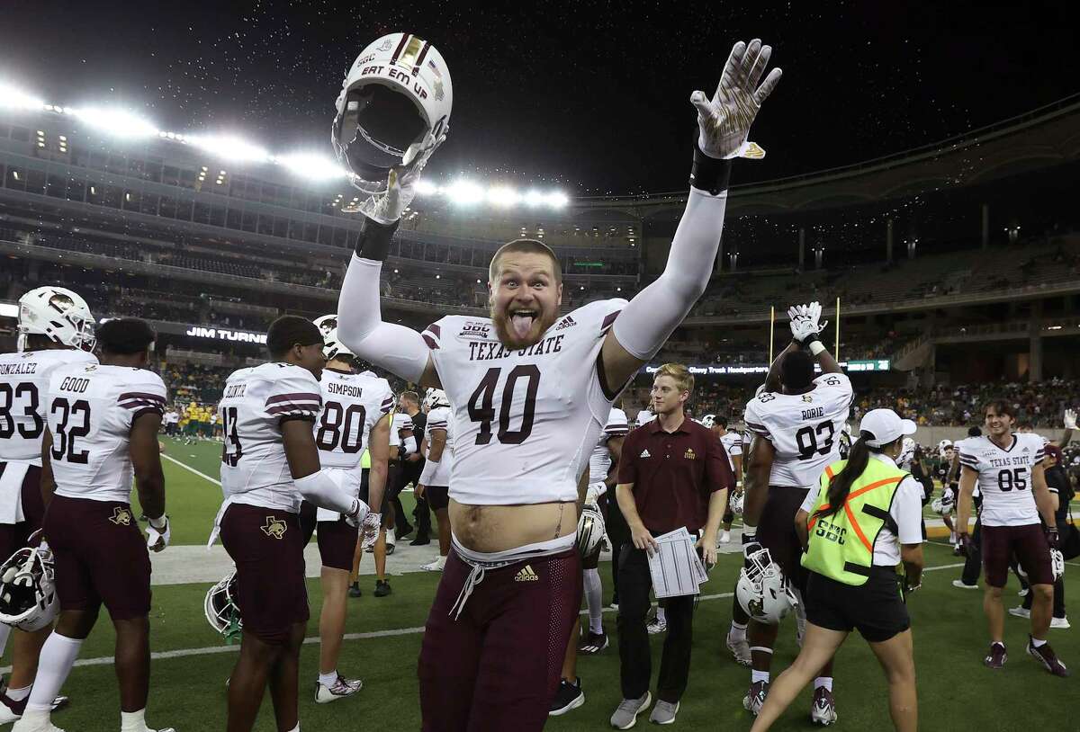 Texas State safety Justin Strong (40) celebrates the team's win over Baylor in an NCAA college football game Saturday, Sept. 3, 2023, in Waco, Texas. (Jerry Larson/Waco Tribune-Herald via AP)