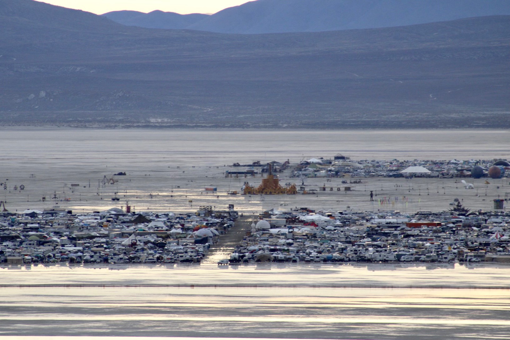 Photo shows rare flooding at Burning Man effigy and campsites