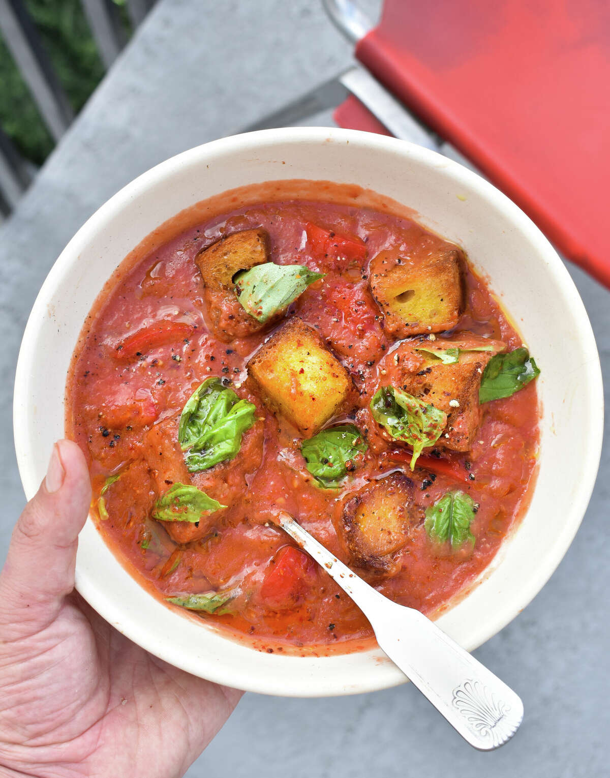 Lazy Early Girl Tomato Gazpacho with large croutons is a quick blend of Bay Area favorite summer tomatoes, cucumbers, and onions.