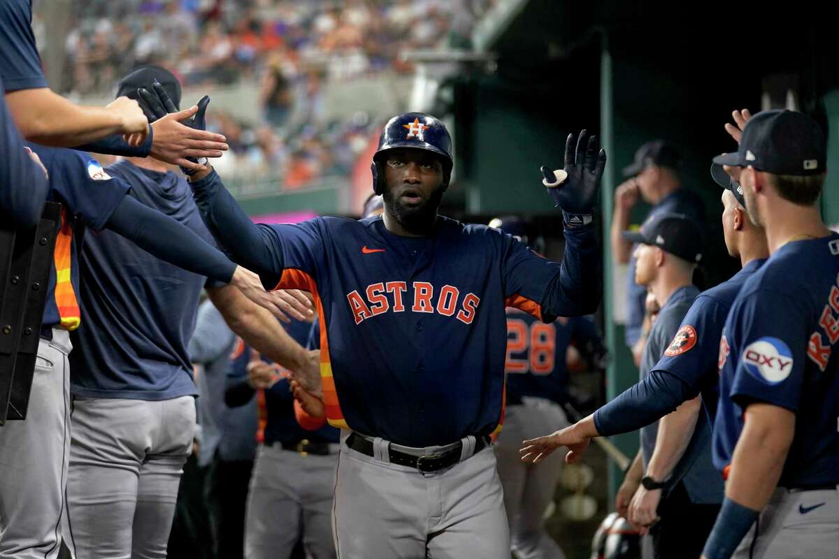 Astros hit 5 homers in 13-6 win over Rangers