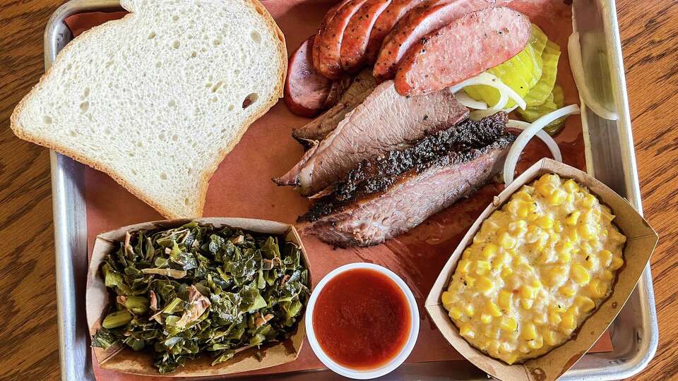 Two-meat plate with brisket and sausage at The Brisket House