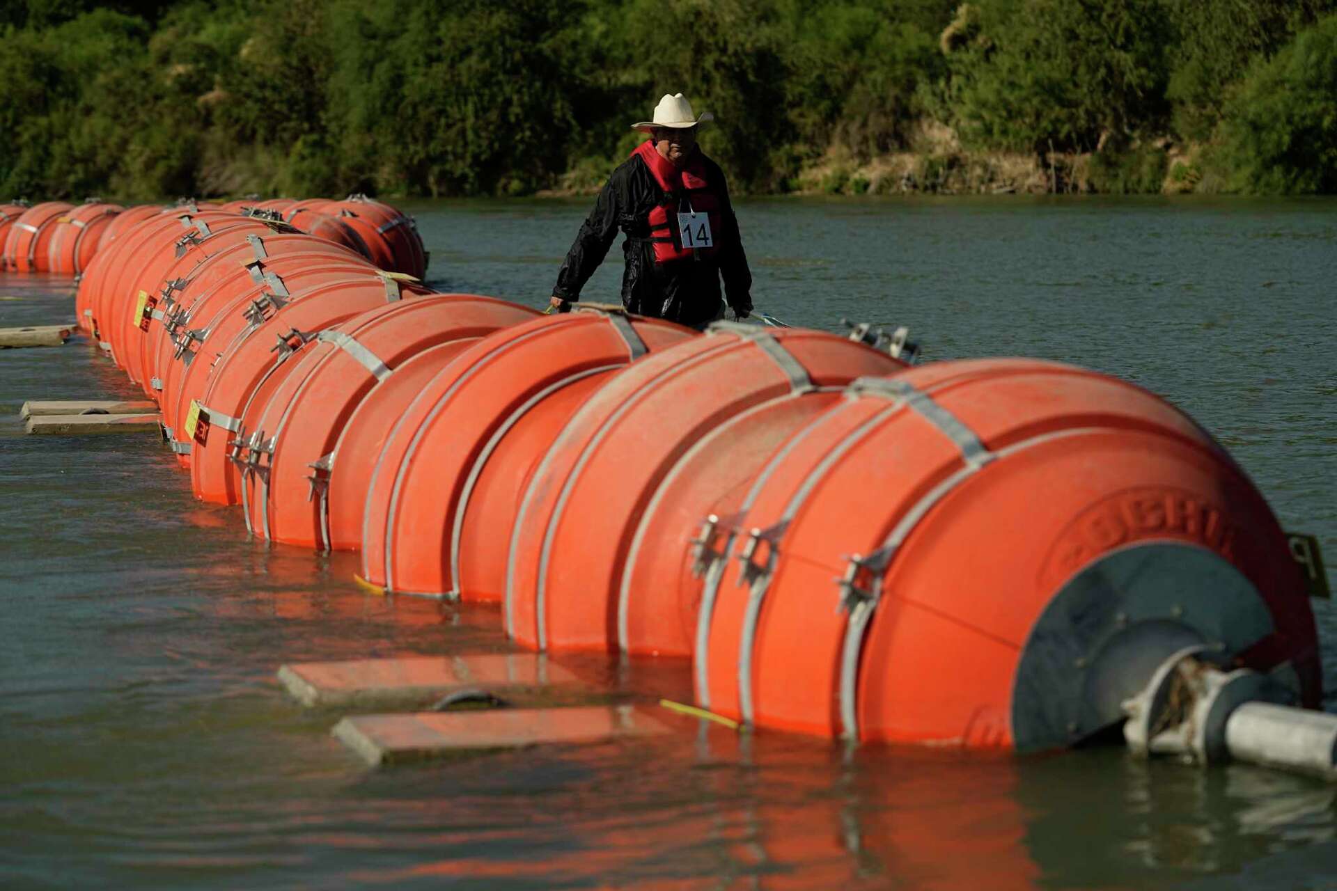 Texas Gov. Greg Abbott ordered to remove buoys from Rio Grande