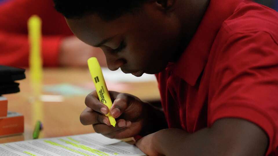 A Audrey H. Lawson Middle School student works on their worksheet during class Wednesday, Sept. 6, 2023 in Houston.