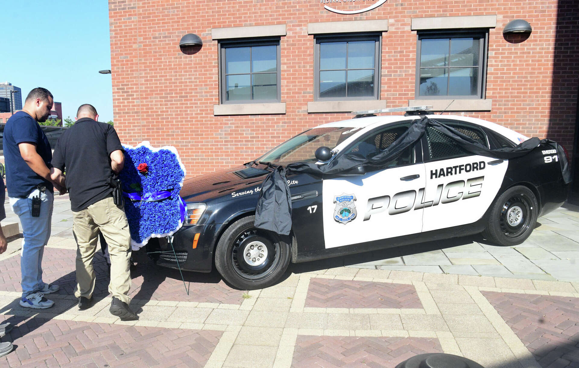 Officials: Hartford police officer killed by student who ran red light