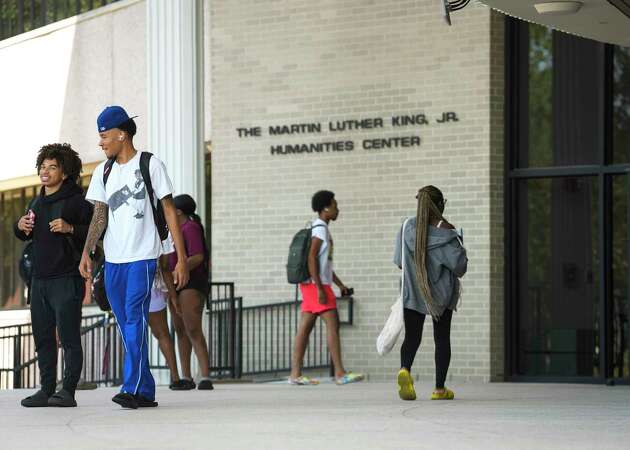 Students walk outside The Martin Luther King, Jr., Humanities Center at Texas Southern University on Thursday, Sept. 7, 2023 in Houston. TSU is one of many state higher education institutions that don't meet the criteria for entry into the $4 billion Texas University Fund, an endowment that is expected to bolster the research standing of its members.