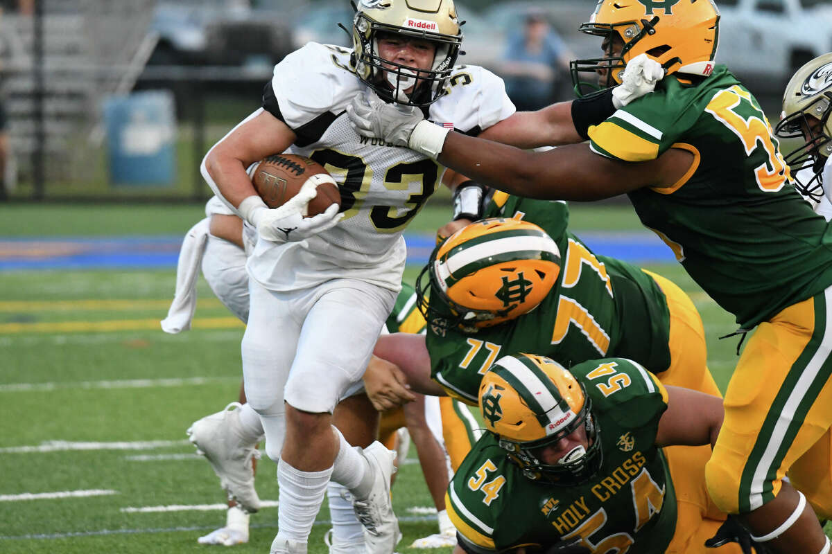 Holy Cross defeats Woodland in CT high school football opener