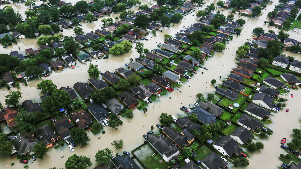 In August, Hurricane Harvey turned streets into rivers in this neighborhood near Interstate 10 East. ( Brett Coomer / Houston Chronicle )