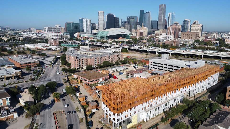 Construction progresses on the first phase of the Mill, a seven-story apartment building with retail and parking at 2315 Navigation Blvd.