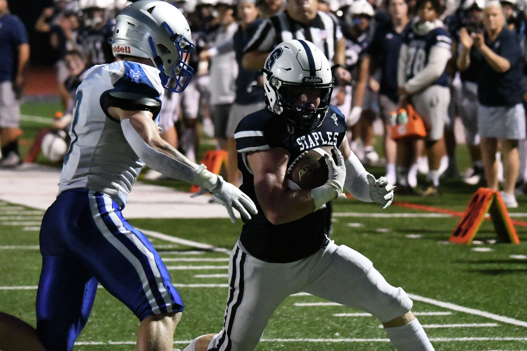 West Haven football playmakers Reid, Kemp lead opening win at Staples